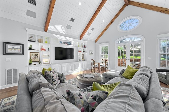 1307 Elton Ln, Austin, TX 78703 - living room with wood finished floors, french doors, high vaulted ceiling, and a wooden ceiling with exposed beams