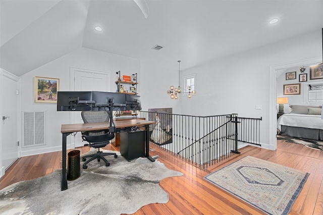 1307 Elton Ln, Austin, TX 78703 - office featuring wood finished floors, a chandelier, recessed lighting, and lofted ceiling