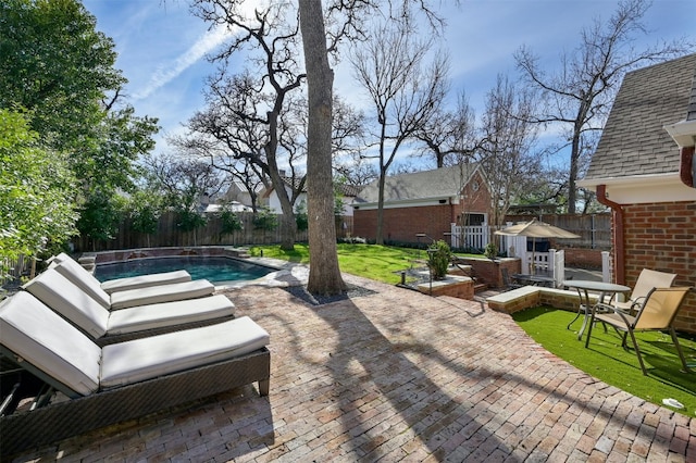 1307 Elton Ln, Austin, TX 78703 - view of pool with a fenced backyard, a patio, and an outbuilding