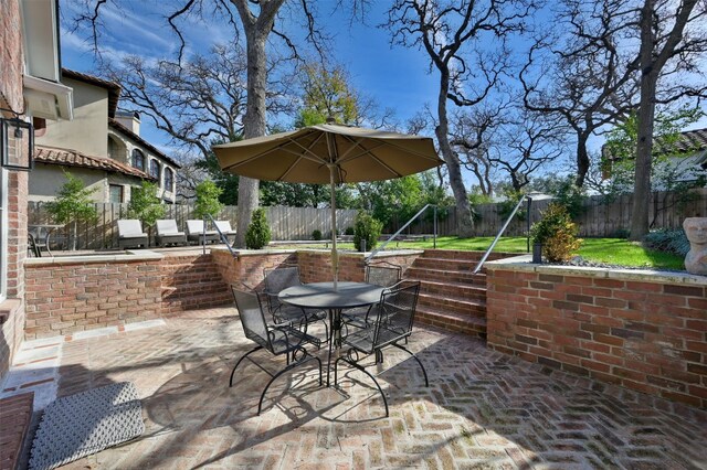 1307 Elton Ln, Austin, TX 78703 - fenced backyard with a patio and outdoor dining space