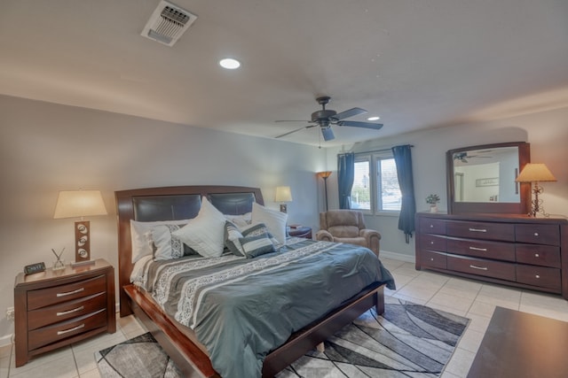 605 Port Unit 3, Horseshoe Bay, TX 78657 - bedroom featuring light tile patterned floors, recessed lighting, baseboards, and a ceiling fan