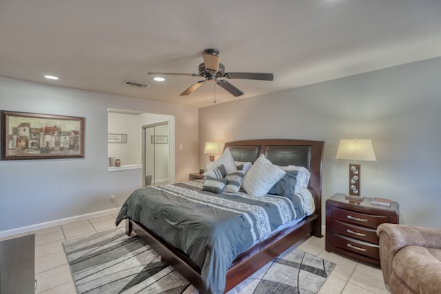605 Port Unit 3, Horseshoe Bay, TX 78657 - bedroom with light tile patterned floors, recessed lighting, ceiling fan, and baseboards
