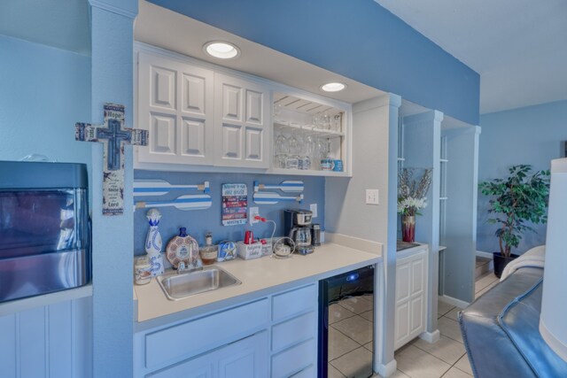 605 Port Unit 3, Horseshoe Bay, TX 78657 - indoor wet bar featuring wine cooler, light tile patterned flooring, and recessed lighting