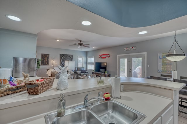 605 Port Unit 3, Horseshoe Bay, TX 78657 - kitchen featuring a sink, recessed lighting, light countertops, ceiling fan, and hanging light fixtures