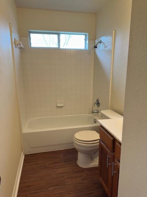 377 Donatello, Kyle, TX 78640 - full bath with wood finished floors, vanity, and shower / bathtub combination