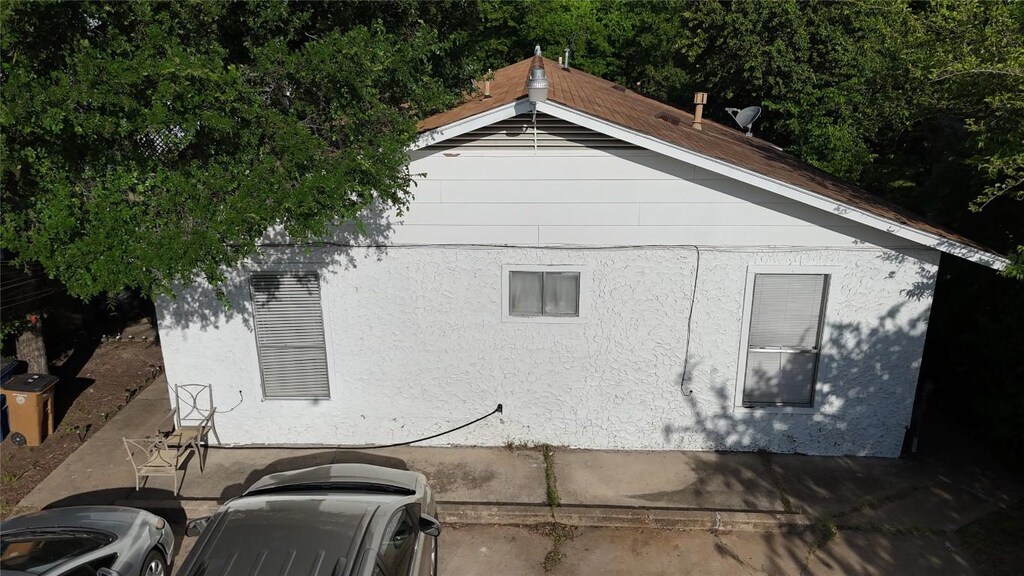 view of property exterior with stucco siding