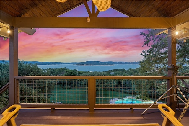 5224 Mccormick Mountain Dr, Austin, TX 78734 - balcony at dusk with a water view