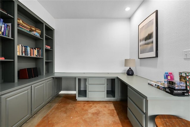 5224 Mccormick Mountain Dr, Austin, TX 78734 - home office with built in study area, concrete flooring, and recessed lighting