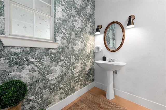 5224 Mccormick Mountain Dr, Austin, TX 78734 - bathroom featuring baseboards and wood finished floors