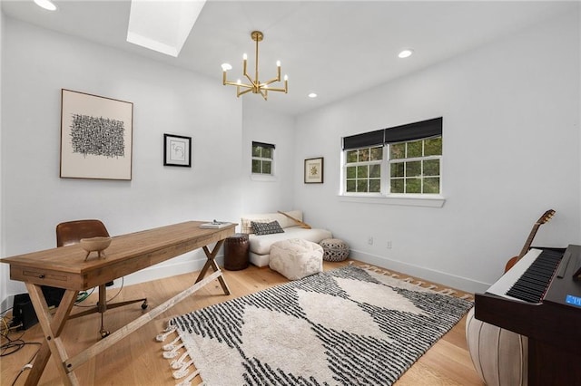 5224 Mccormick Mountain Dr, Austin, TX 78734 - office area featuring a skylight, a chandelier, recessed lighting, wood finished floors, and baseboards