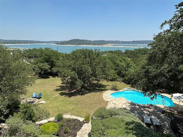 5224 Mccormick Mountain Dr, Austin, TX 78734 - outdoor pool with a water view and a lawn
