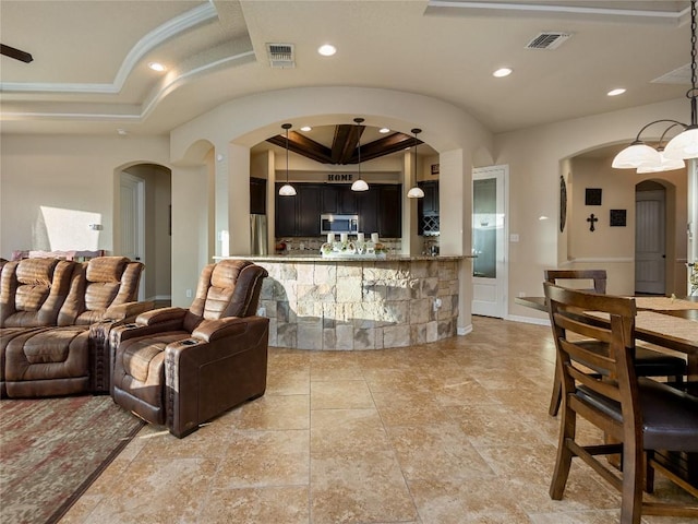 interior space featuring bar, visible vents, recessed lighting, and arched walkways