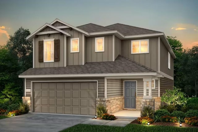 312 Singing Dove Way, Liberty Hill, TX 78642 - craftsman inspired home with board and batten siding, an attached garage, stone siding, concrete driveway, and a shingled roof