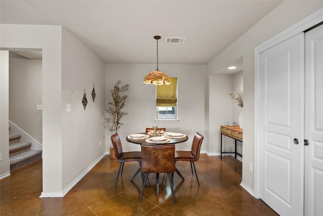 437 Venture Blvd S, Point Venture, TX 78645 - dining space with dark tile patterned flooring and stairway