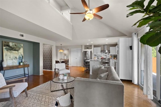 437 Venture Blvd S, Point Venture, TX 78645 - living area featuring ceiling fan and high vaulted ceiling