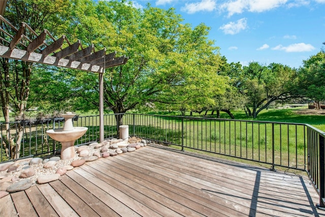 316 Trail Of The Flowers, Georgetown, TX 78633 - wooden terrace with a lawn, view of scattered trees, and a pergola