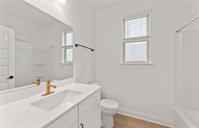 329 Singing Dove Way, Liberty Hill, TX 78642 - bathroom featuring vanity, wood finished floors, and bathing tub / shower combination