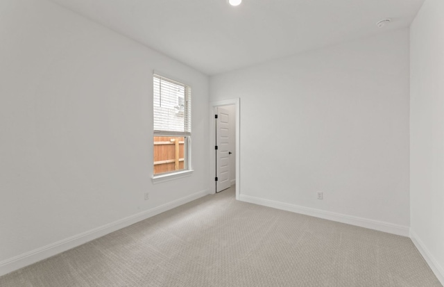 329 Singing Dove Way, Liberty Hill, TX 78642 - unfurnished room featuring light colored carpet