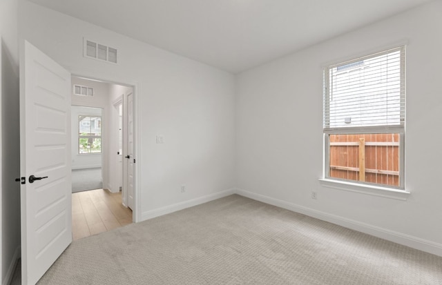 329 Singing Dove Way, Liberty Hill, TX 78642 - carpeted spare room featuring baseboards