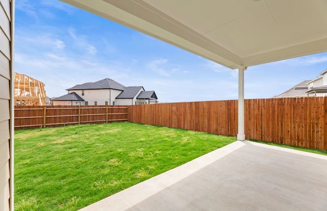 329 Singing Dove Way, Liberty Hill, TX 78642 - fenced backyard featuring a patio