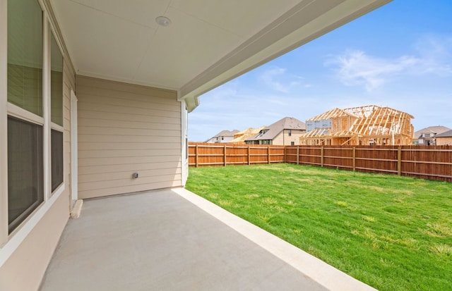 329 Singing Dove Way, Liberty Hill, TX 78642 - fenced backyard with a patio area and a residential view