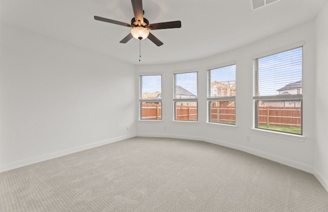 329 Singing Dove Way, Liberty Hill, TX 78642 - empty room featuring light carpet and ceiling fan