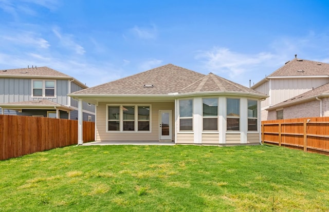 329 Singing Dove Way, Liberty Hill, TX 78642 - rear view of property featuring a fenced backyard, a patio, and a shingled roof