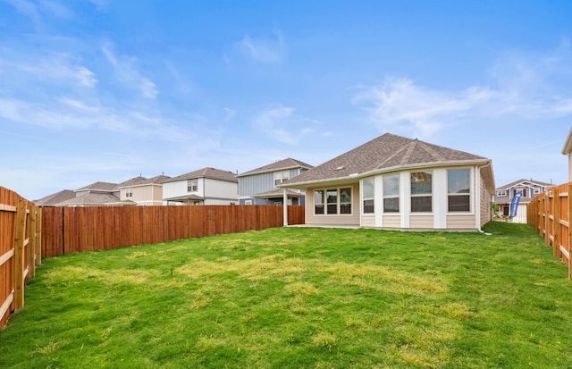 329 Singing Dove Way, Liberty Hill, TX 78642 - rear view of property featuring a fenced backyard and a residential view