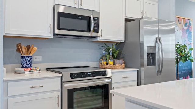 2634 Caleb Asher Loop, Round Rock, TX 78665 - kitchen featuring light countertops, white cabinets, and stainless steel appliances