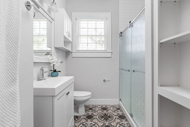 207 W 39th St, Austin, TX 78751 - bathroom featuring vanity, a stall shower, and tile patterned flooring