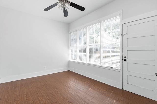 207 W 39th St, Austin, TX 78751 - empty room with a ceiling fan and dark wood finished floors