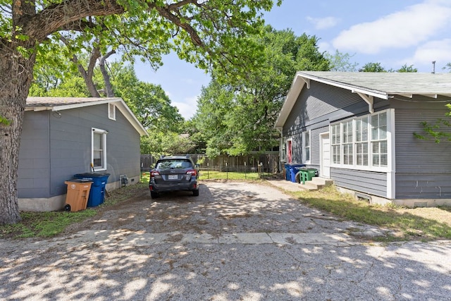 207 W 39th St, Austin, TX 78751 - view of property exterior with driveway and entry steps