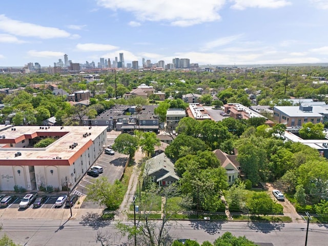 207 W 39th St, Austin, TX 78751 - drone / aerial view of city skyline and a tree filled landscape