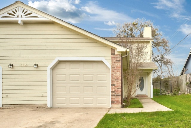 view of front of home featuring fence, a front lawn, brick siding, a chimney, and concrete driveway