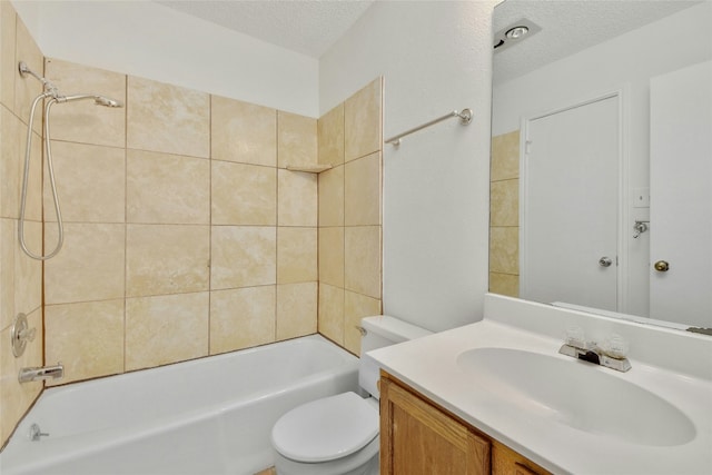 full bathroom with toilet, a textured ceiling, vanity, and shower / bathing tub combination
