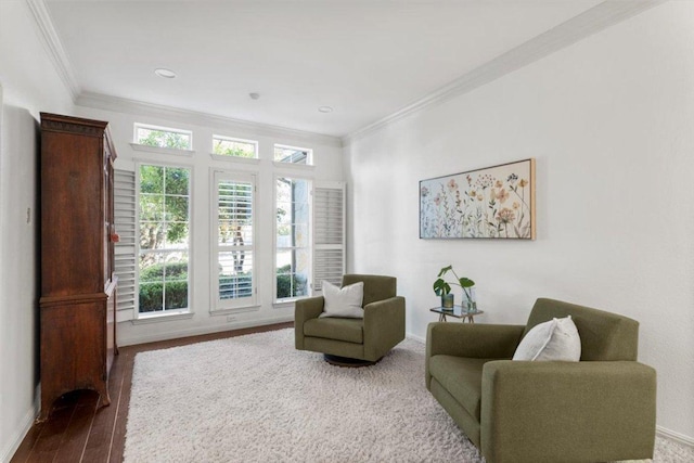 5909 Sunset Rdg, Austin, TX 78735 - sitting room featuring ornamental molding, wood finished floors, and baseboards