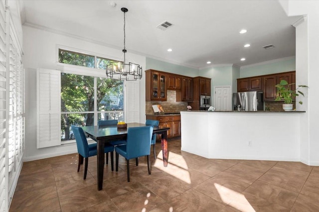 5909 Sunset Rdg, Austin, TX 78735 - dining space with a chandelier, crown molding, recessed lighting, tile patterned flooring, and baseboards