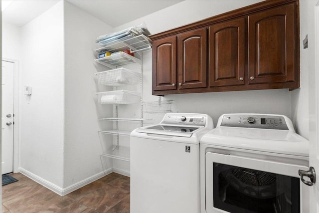 5909 Sunset Rdg, Austin, TX 78735 - washroom featuring separate washer and dryer, cabinet space, and baseboards