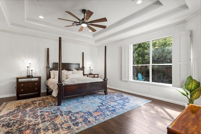 5909 Sunset Rdg, Austin, TX 78735 - bedroom with a tray ceiling, crown molding, hardwood / wood-style floors, baseboards, and recessed lighting
