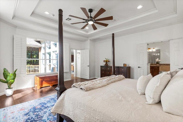 5909 Sunset Rdg, Austin, TX 78735 - bedroom with a tray ceiling, wood finished floors, crown molding, baseboards, and recessed lighting