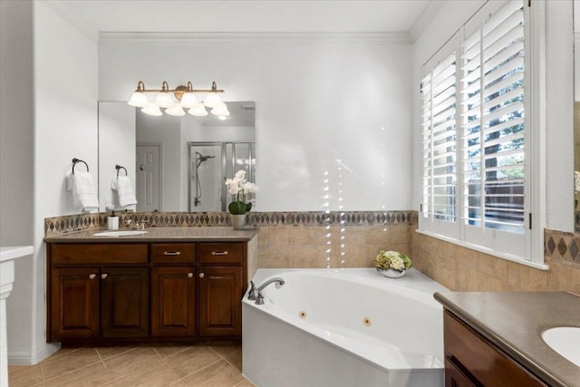 5909 Sunset Rdg, Austin, TX 78735 - full bathroom with plenty of natural light, two vanities, a whirlpool tub, a shower stall, and crown molding