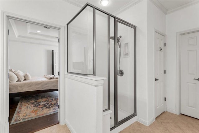 5909 Sunset Rdg, Austin, TX 78735 - ensuite bathroom featuring crown molding, a stall shower, and baseboards