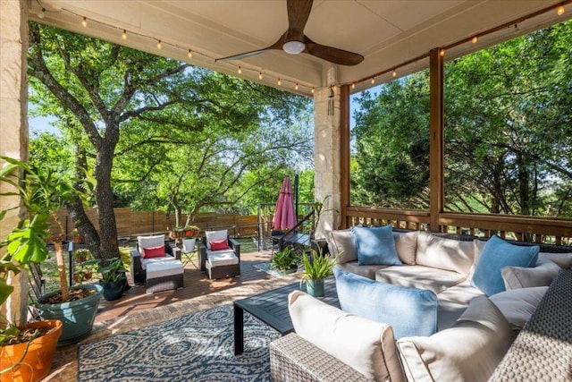 5909 Sunset Rdg, Austin, TX 78735 - fenced backyard with outdoor lounge area and a ceiling fan