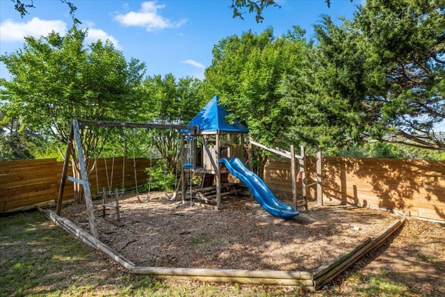 5909 Sunset Rdg, Austin, TX 78735 - view of playground with a fenced backyard