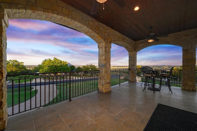 1298 Mystic Pkwy, Spring Branch, TX 78070 - patio terrace at dusk featuring a ceiling fan