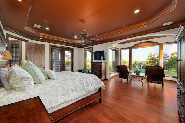 1298 Mystic Pkwy, Spring Branch, TX 78070 - bedroom featuring a tray ceiling, ornamental molding, access to outside, dark wood-style flooring, and french doors