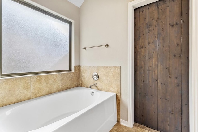 1310 Neuberry Clf, Temple, TX 76502 - full bathroom with a garden tub