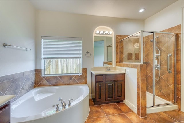 2801 Mirasol Dr, Round Rock, TX 78681 - bathroom with vanity, a bath, and a stall shower