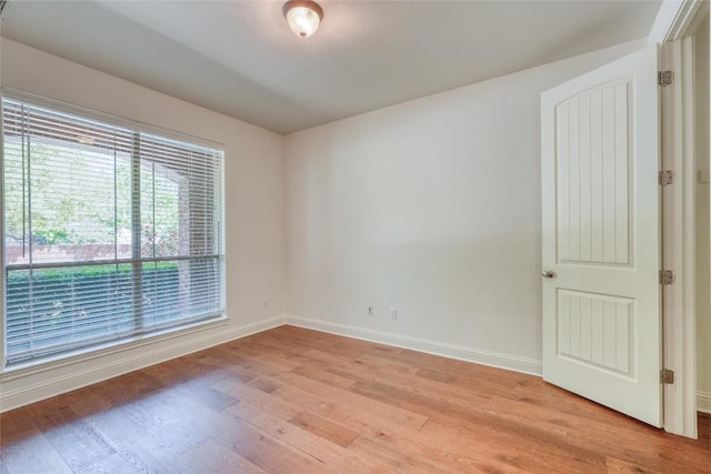 2801 Mirasol Dr, Round Rock, TX 78681 - spare room featuring light wood-style flooring and baseboards