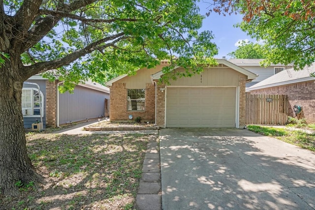 840 Eagles Way, Leander, TX 78641 - view of front of house with driveway, brick siding, and a garage